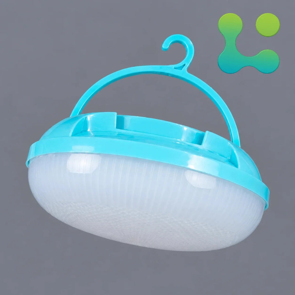A portable hanging light with a translucent white ribbed dome shade and a bright cyan plastic handle and rim, shown against a plain gray background. A small green-to-blue gradient logo appears in the top-right corner.